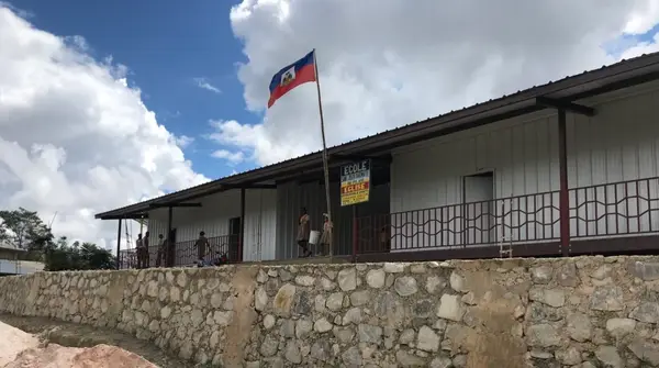 An HEF school with the Haitian flag flying