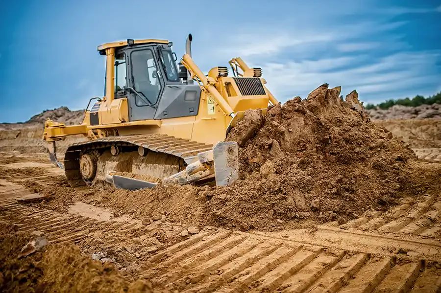 Dozer grading raw ground on a Dawson County site