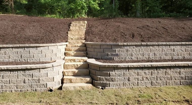 Terraced block retaining walls with a central flight of stone steps
