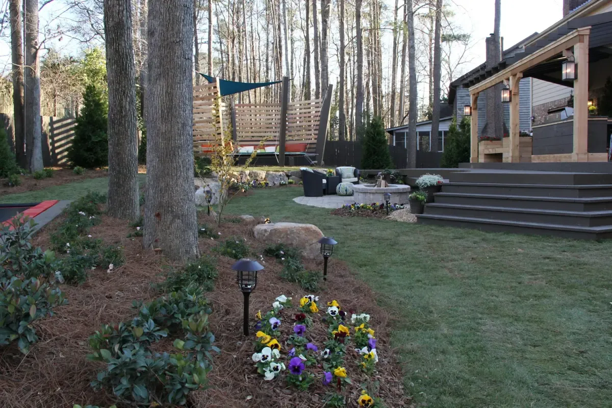Woodland planting and steps beside an outdoor living area
