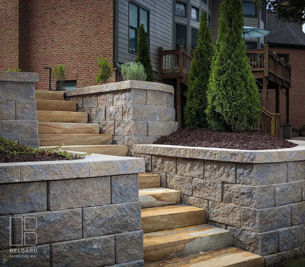 Stone steps framed by masonry retaining walls