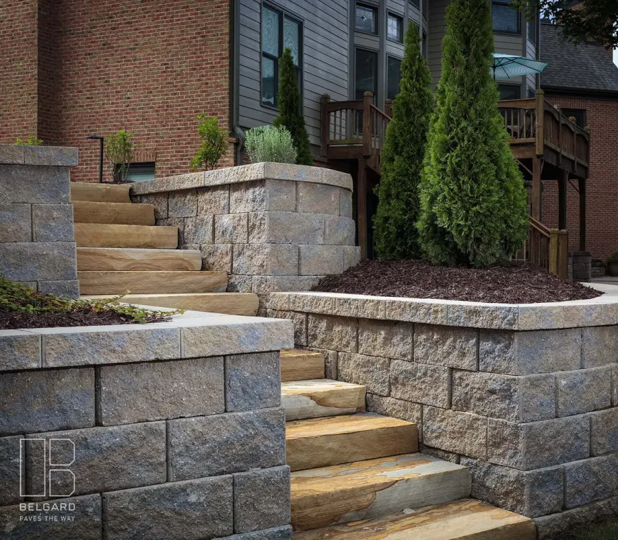 Stone steps framed by masonry retaining walls