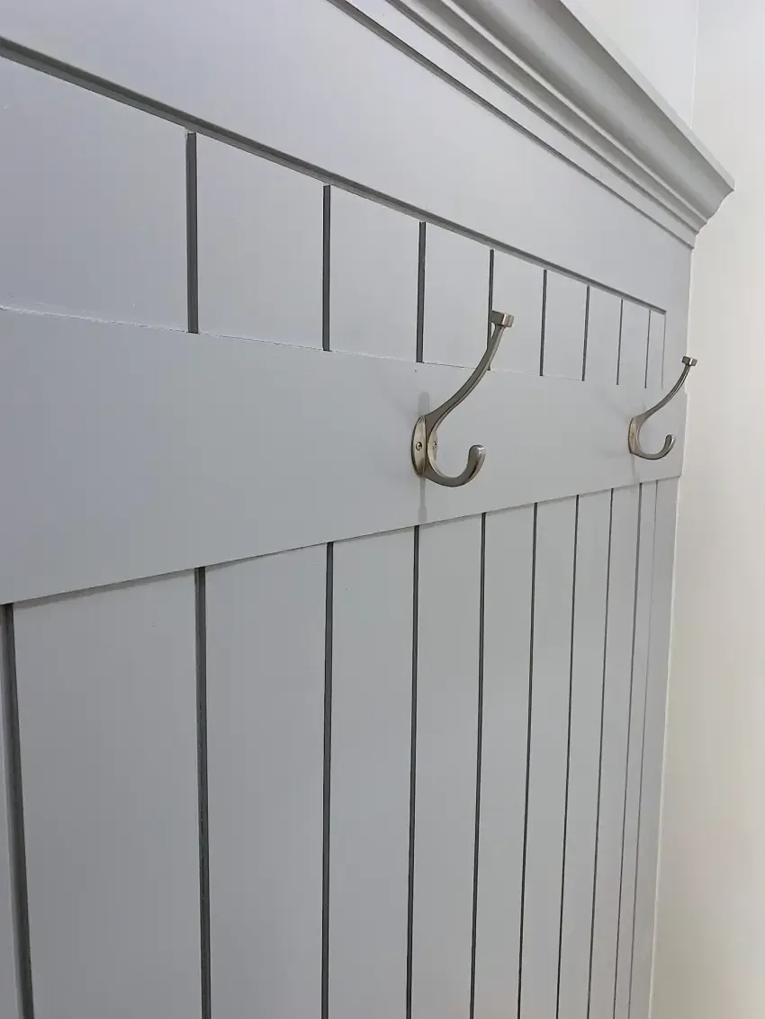 Mudroom paneling & coat hooks